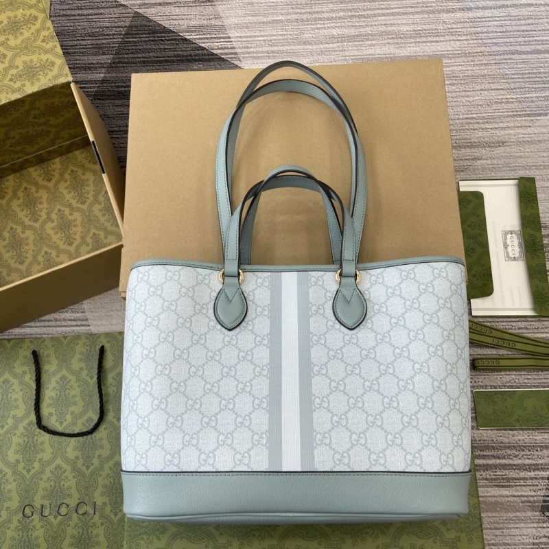 G*u*i shopping bags